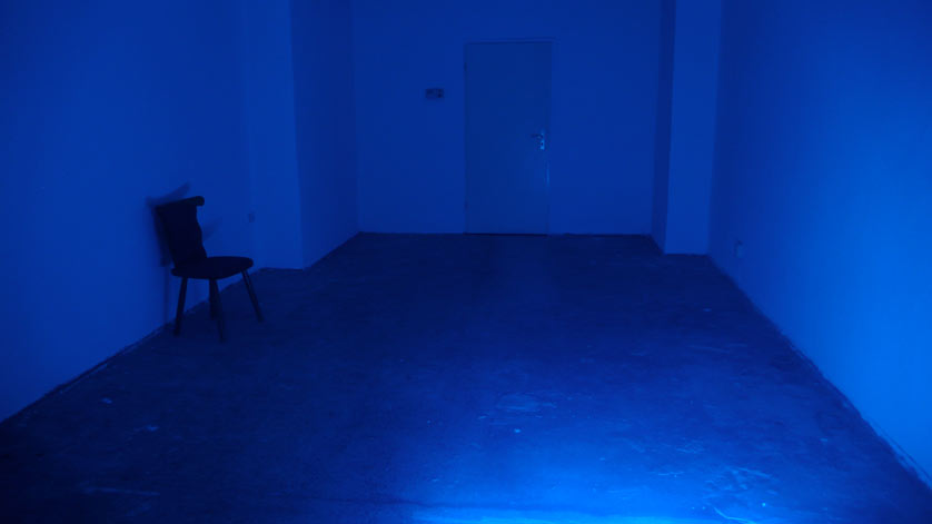 blue room with one stool